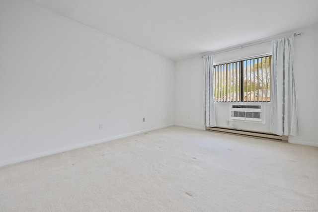 97 Richards Ave Apt F5, Norwalk, CT 06854 - unfurnished room featuring carpet floors, a baseboard radiator, baseboards, and a wall unit AC