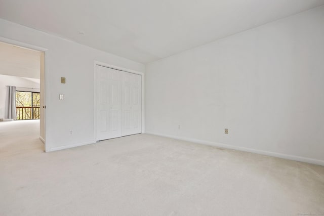 97 Richards Ave Apt F5, Norwalk, CT 06854 - unfurnished bedroom featuring baseboards, light carpet, and a closet