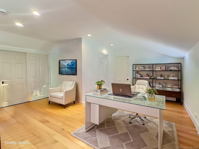 office area with lofted ceiling, light wood-type flooring, recessed lighting, and baseboards