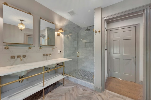 full bathroom with visible vents and a shower stall