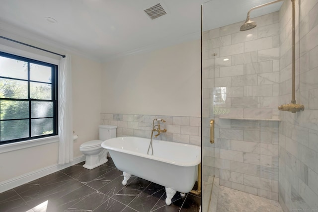 bathroom featuring visible vents, ornamental molding, marble finish floor, a walk in shower, and a freestanding bath