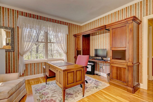 home office with wallpapered walls, ornamental molding, baseboards, and light wood-type flooring