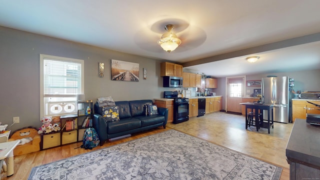 living area featuring ceiling fan