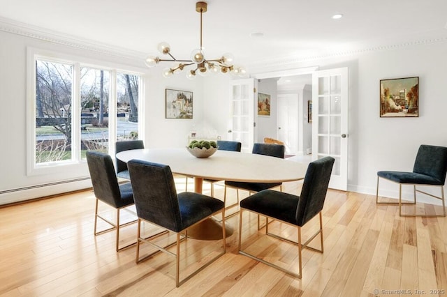 81 Silver Hill Rd, Ridgefield, CT 06877 - dining space featuring an inviting chandelier, ornamental molding, light wood-style floors, and french doors