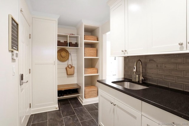81 Silver Hill Rd, Ridgefield, CT 06877 - mudroom featuring a sink, dark tile patterned flooring, and ornamental molding