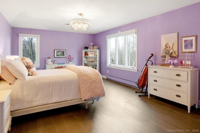 81 Silver Hill Rd, Ridgefield, CT 06877 - bedroom featuring dark wood-style flooring, a chandelier, and baseboard heating