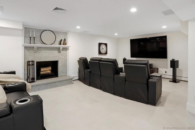 81 Silver Hill Rd, Ridgefield, CT 06877 - cinema room featuring a baseboard radiator, a brick fireplace, recessed lighting, and visible vents