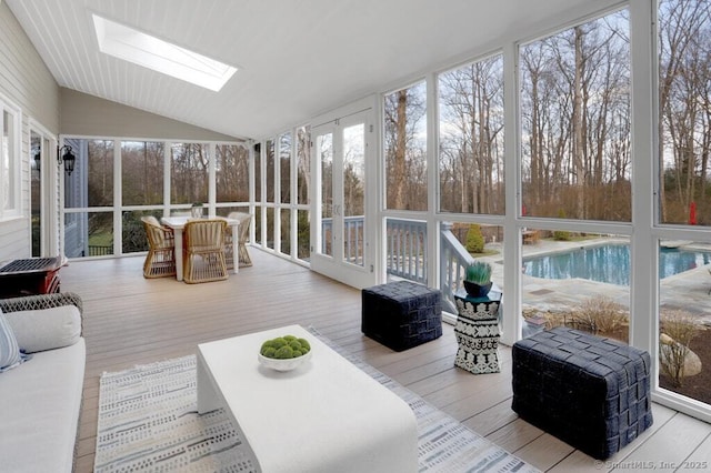 81 Silver Hill Rd, Ridgefield, CT 06877 - sunroom featuring wood finished floors and lofted ceiling with skylight