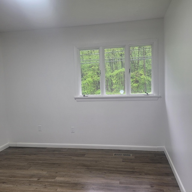 1848 Waterbury Rd, Cheshire, CT 06410 - unfurnished room featuring healthy amount of natural light, dark wood finished floors, and baseboards