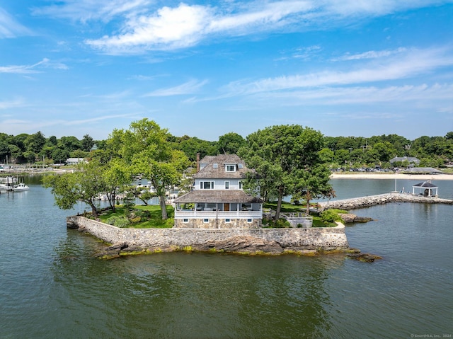 birds eye view of property featuring a water view