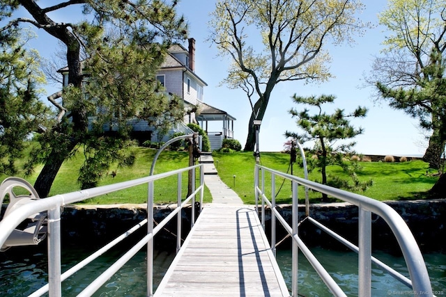 dock area with a lawn