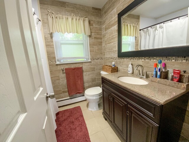 456 Main St, West Haven, CT 06516 - bathroom with baseboard heating, vanity, toilet, tile patterned floors, and a shower with curtain