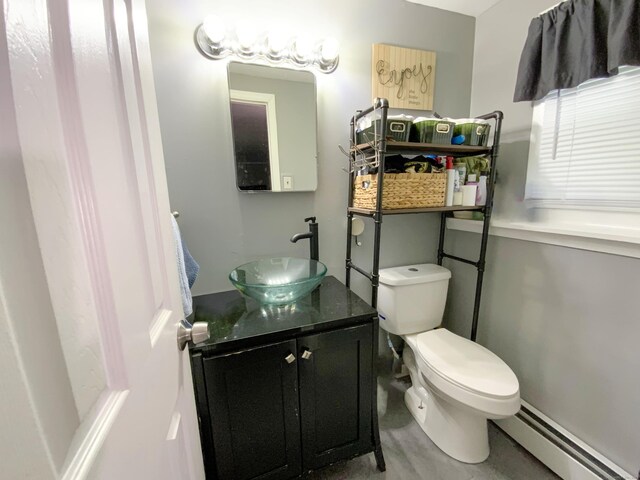 456 Main St, West Haven, CT 06516 - half bathroom with baseboard heating, vanity, and toilet