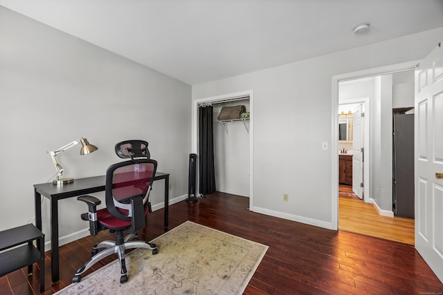 1343 Baldwin Hill Rd, Ledyard, CT 06335 - home office featuring hardwood / wood-style flooring and baseboards