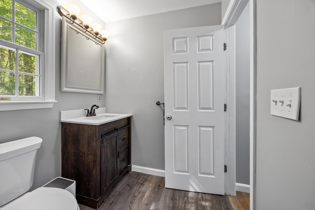 1343 Baldwin Hill Rd, Ledyard, CT 06335 - bathroom with toilet, wood finished floors, and healthy amount of natural light