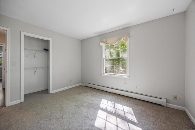 1343 Baldwin Hill Rd, Ledyard, CT 06335 - unfurnished bedroom with a baseboard radiator, carpet floors, a closet, and baseboards