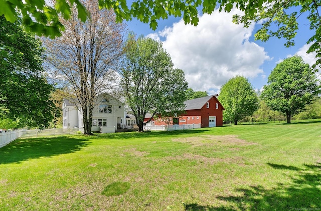 309 N Grand St, Suffield, CT 06093 - view of yard featuring a detached garage