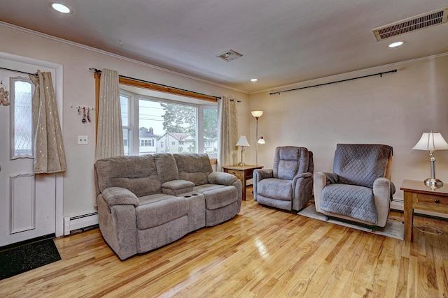 27 Aircraft Rd, West Haven, CT 06516 - living room featuring a baseboard heating unit, wood finished floors, crown molding, and recessed lighting