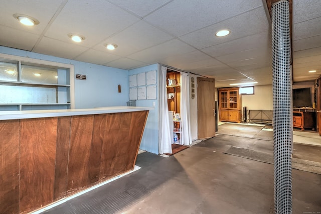 27 Aircraft Rd, West Haven, CT 06516 - indoor dry bar with concrete floors and a drop ceiling