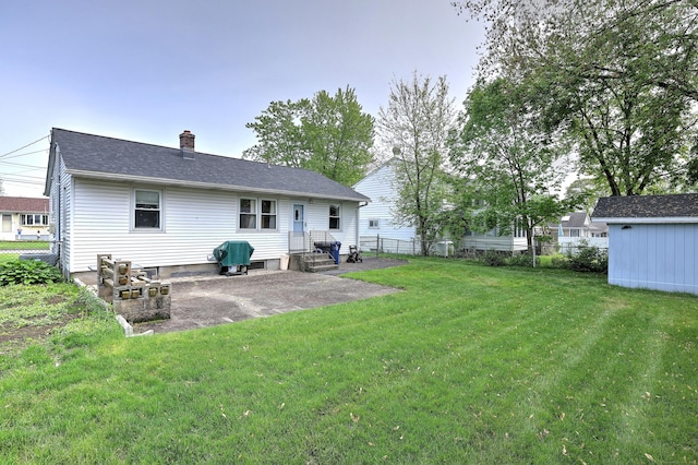 27 Aircraft Rd, West Haven, CT 06516 - back of house featuring a chimney, a patio, and entry steps