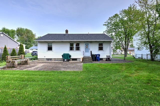 27 Aircraft Rd, West Haven, CT 06516 - rear view of house featuring a patio and a chimney
