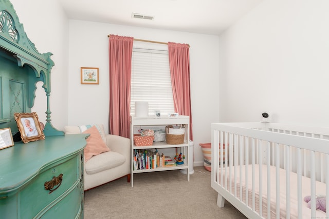 39 Wildemere Ave, Milford, CT 06460 - carpeted bedroom featuring a crib and visible vents
