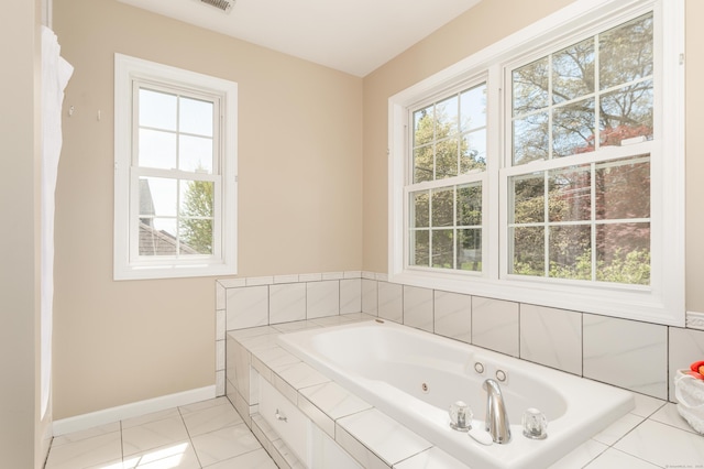 39 Wildemere Ave, Milford, CT 06460 - bathroom featuring plenty of natural light, baseboards, visible vents, and a jetted tub