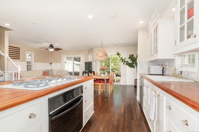 39 Wildemere Ave, Milford, CT 06460 - kitchen with a sink, white appliances, dark wood-style floors, and a healthy amount of sunlight