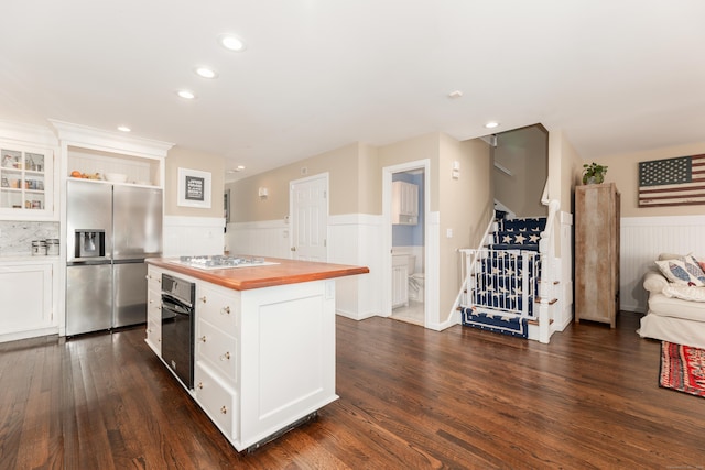 39 Wildemere Ave, Milford, CT 06460 - kitchen with wainscoting, stainless steel refrigerator with ice dispenser, butcher block countertops, and oven
