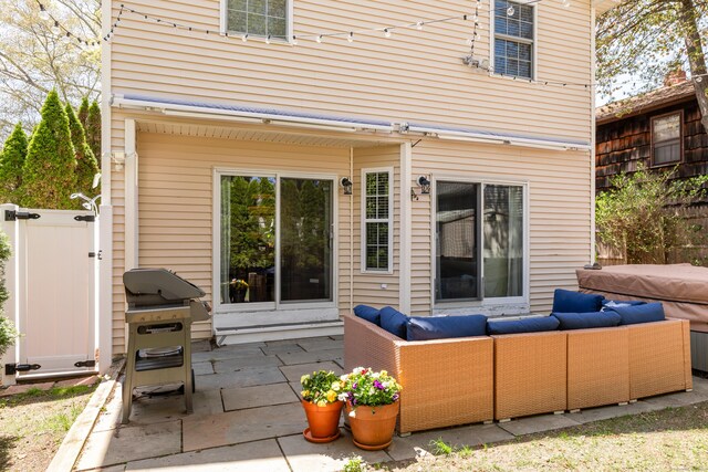 39 Wildemere Ave, Milford, CT 06460 - back of property with fence, a patio, and an outdoor living space