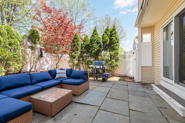 39 Wildemere Ave, Milford, CT 06460 - view of patio with grilling area, an outdoor living space, and a fenced backyard