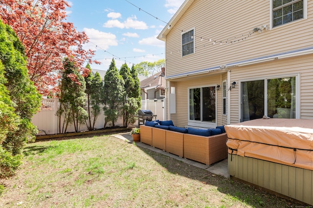 39 Wildemere Ave, Milford, CT 06460 - rear view of house featuring a yard, fence, and an outdoor living space