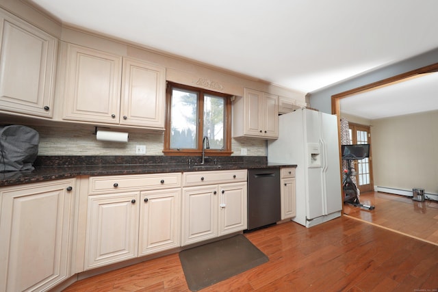 227 Hany Ln, Vernon, CT 06066 - kitchen featuring dishwashing machine, backsplash, healthy amount of natural light, and light wood-style floors