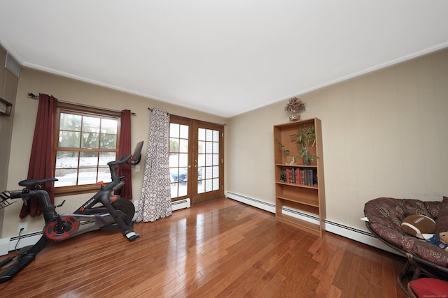 227 Hany Ln, Vernon, CT 06066 - exercise room with french doors, wood finished floors, ornamental molding, and a baseboard heating unit
