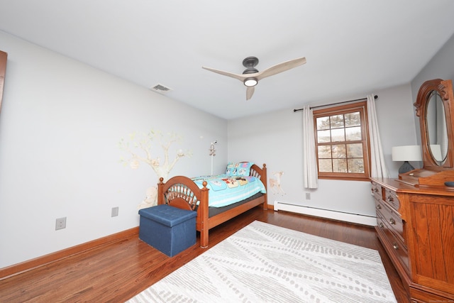 227 Hany Ln, Vernon, CT 06066 - bedroom with a baseboard radiator, dark wood-style floors, baseboards, and a ceiling fan
