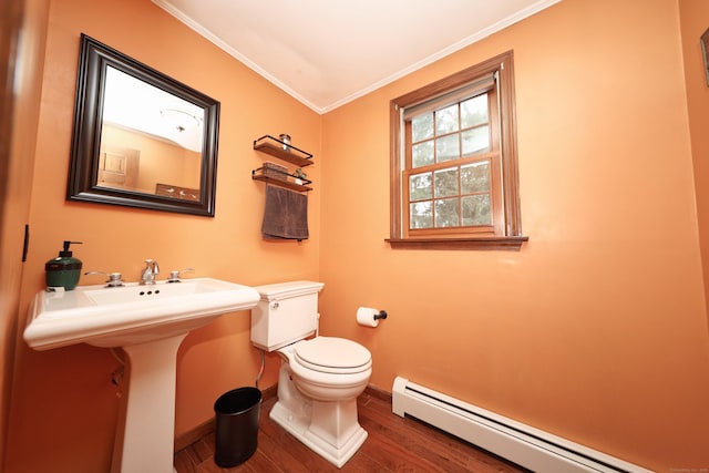 227 Hany Ln, Vernon, CT 06066 - half bathroom featuring baseboard heating, ornamental molding, wood finished floors, toilet, and baseboards