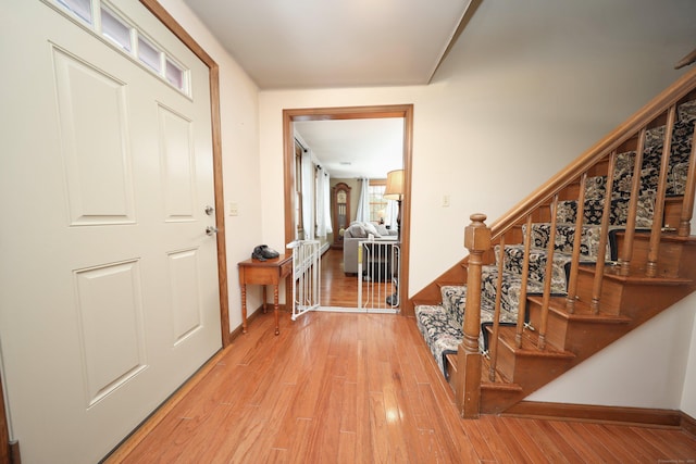 227 Hany Ln, Vernon, CT 06066 - entrance foyer with light wood-style flooring, stairs, and baseboards