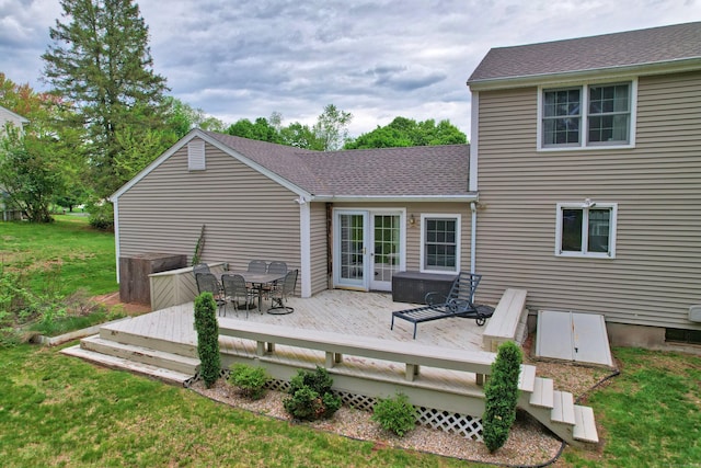 227 Hany Ln, Vernon, CT 06066 - back of house with french doors, a wooden deck, a lawn, outdoor dining area, and a shingled roof
