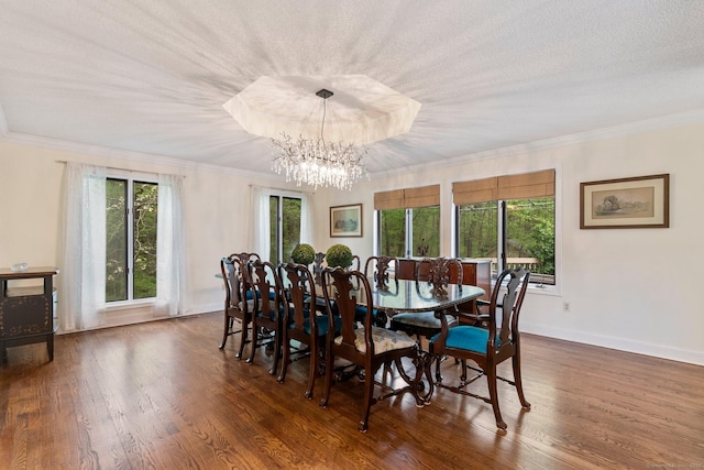 498 Eastbury Hill Rd, Glastonbury, CT 06033 - dining room featuring dark wood-style flooring, a chandelier, ornamental molding, and baseboards