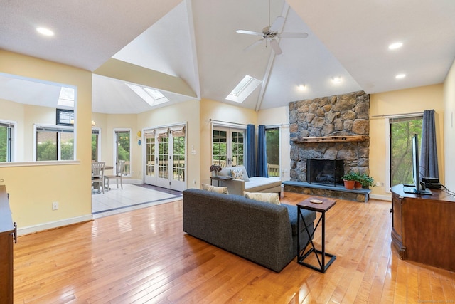 498 Eastbury Hill Rd, Glastonbury, CT 06033 - living area with hardwood / wood-style flooring, a skylight, a ceiling fan, high vaulted ceiling, and recessed lighting