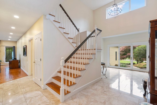 498 Eastbury Hill Rd, Glastonbury, CT 06033 - staircase featuring plenty of natural light, a chandelier, recessed lighting, marble finish flooring, and baseboards