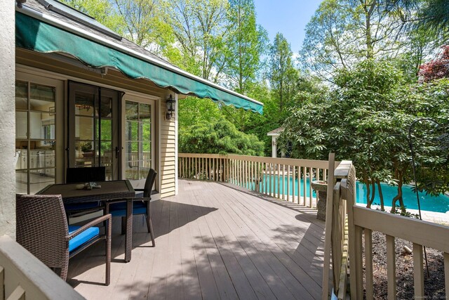 498 Eastbury Hill Rd, Glastonbury, CT 06033 - wooden deck featuring outdoor dining area