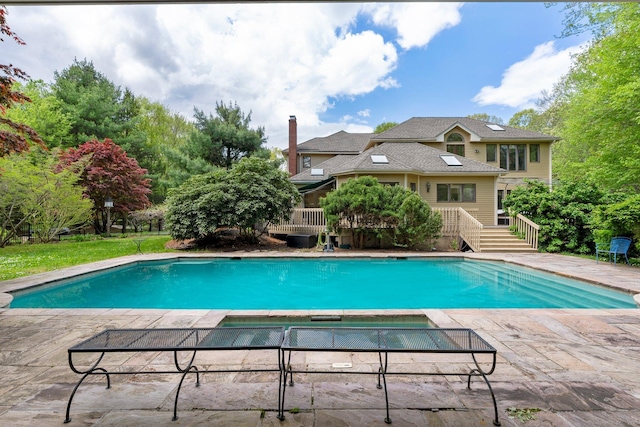 498 Eastbury Hill Rd, Glastonbury, CT 06033 - swimming pool featuring a wooden deck and a patio