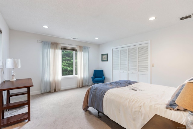 498 Eastbury Hill Rd, Glastonbury, CT 06033 - bedroom with light carpet, recessed lighting, a closet, and baseboards