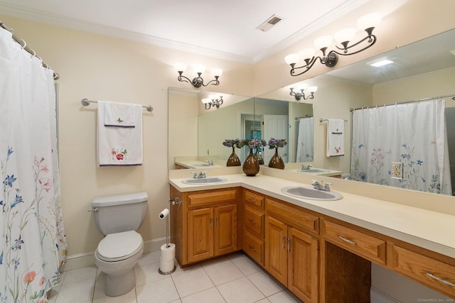 498 Eastbury Hill Rd, Glastonbury, CT 06033 - bathroom with crown molding, double vanity, toilet, tile patterned floors, and baseboards