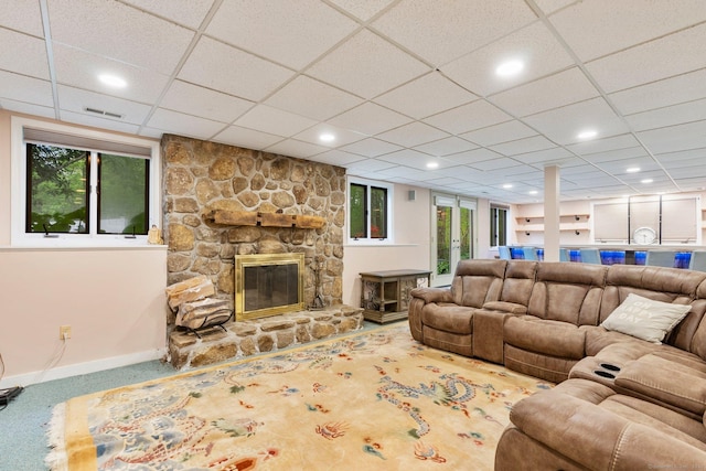 498 Eastbury Hill Rd, Glastonbury, CT 06033 - carpeted living area with baseboards, a fireplace, and a paneled ceiling
