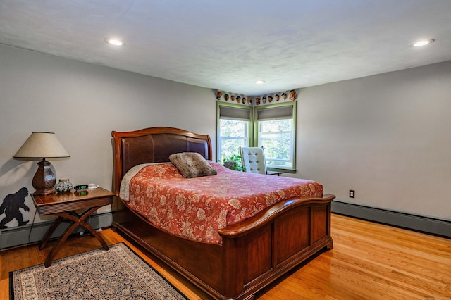97 Doolittle Dr, Bethany, CT 06524 - bedroom with recessed lighting, light wood finished floors, baseboards, and baseboard heating