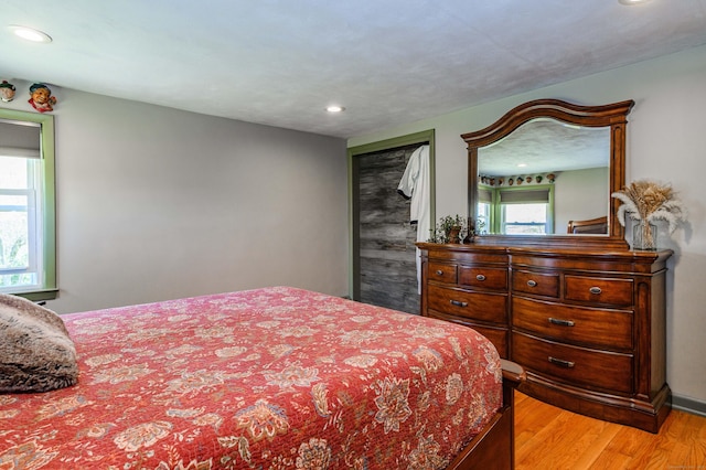 97 Doolittle Dr, Bethany, CT 06524 - bedroom featuring recessed lighting, multiple windows, and light wood-style flooring