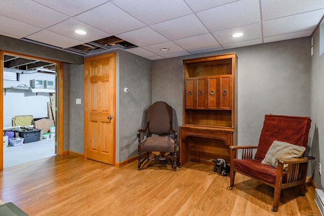 97 Doolittle Dr, Bethany, CT 06524 - sitting room with recessed lighting, a baseboard heating unit, light wood finished floors, and a paneled ceiling