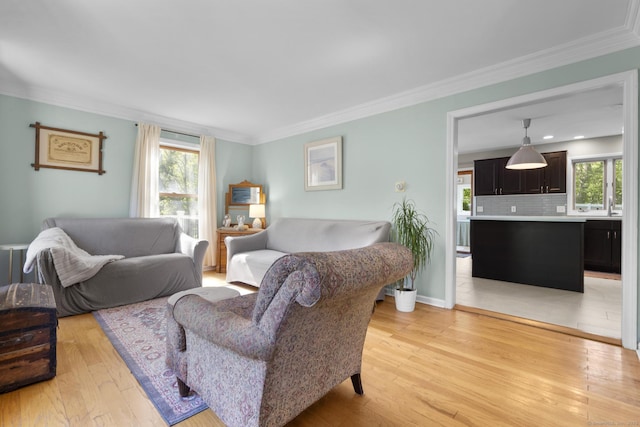 200 Sachem Head Rd, Guilford, CT 06437 - living area featuring light wood-type flooring and crown molding